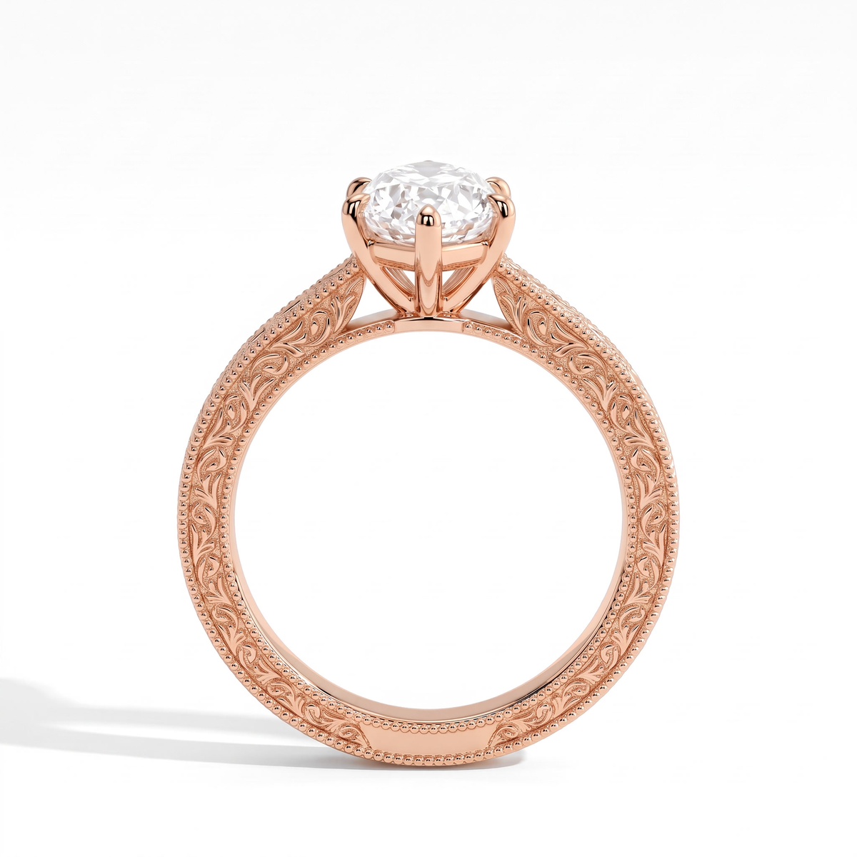 Marquise lab-grown diamond vintage engraved solitaire engagement ring in 14K (585) rose gold, profile view showing the gallery