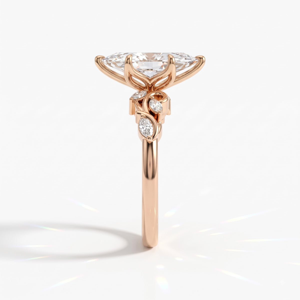 Marquise cut lab-grown diamond vine engagement ring with marquise leaf accents in 14K (585) rose gold, side view