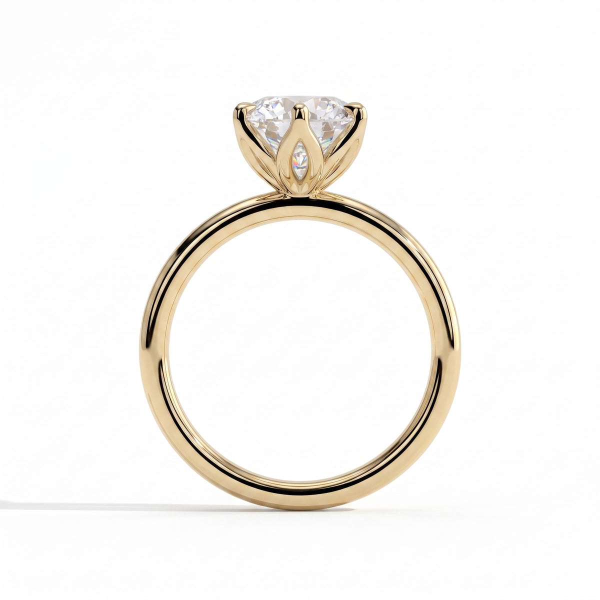 Round lab-grown diamond solitaire engagement ring in 14K (585) yellow gold, side profile