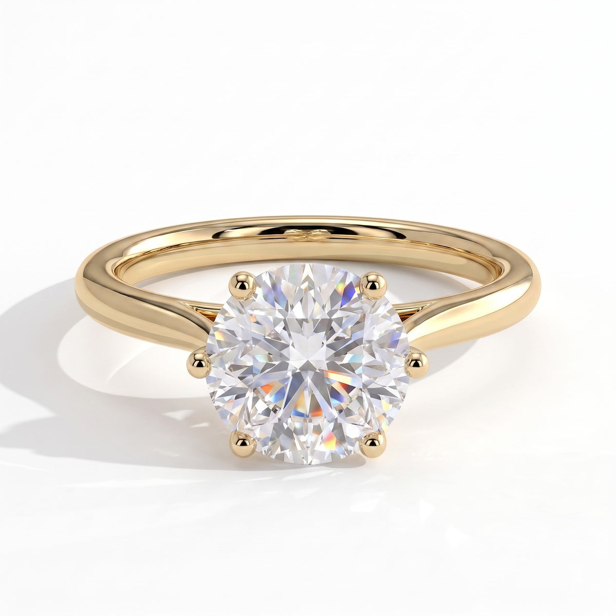 Round lab-grown diamond solitaire engagement ring in 14K (585) yellow gold, front view