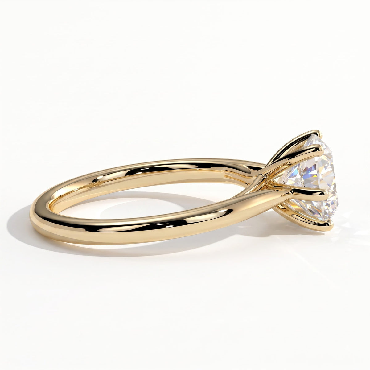 Round lab-grown diamond solitaire engagement ring in 14K (585) yellow gold, detail view