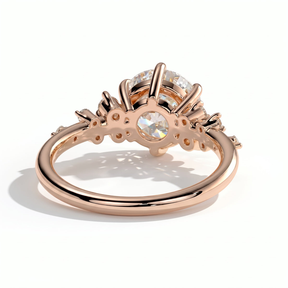 Round lab-grown diamond halo engagement ring in 18K (750) rose gold, on white background