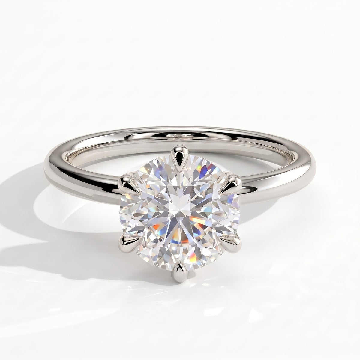 Round lab-grown diamond solitaire engagement ring in 18K (750) white gold, front view