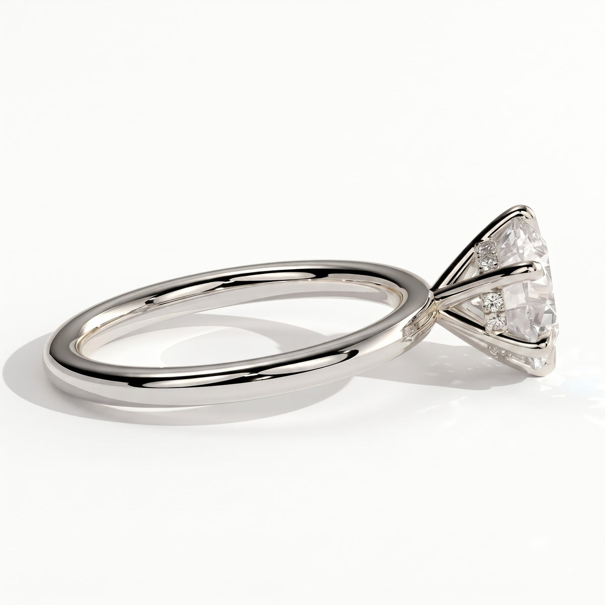 Round lab-grown diamond solitaire engagement ring in 950 platinum, detail view