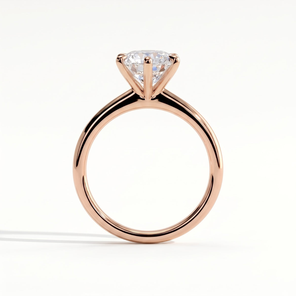 Round lab-grown diamond halo engagement ring in 18K (750) rose gold, side profile