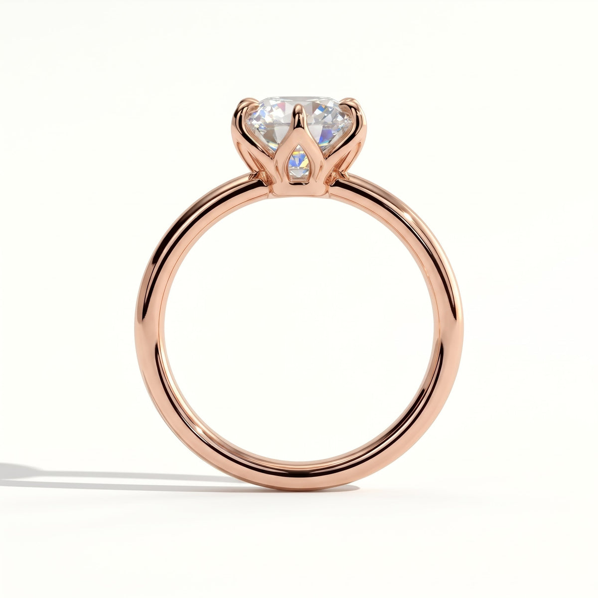 Round lab-grown diamond solitaire engagement ring in 14K (585) rose gold, side profile