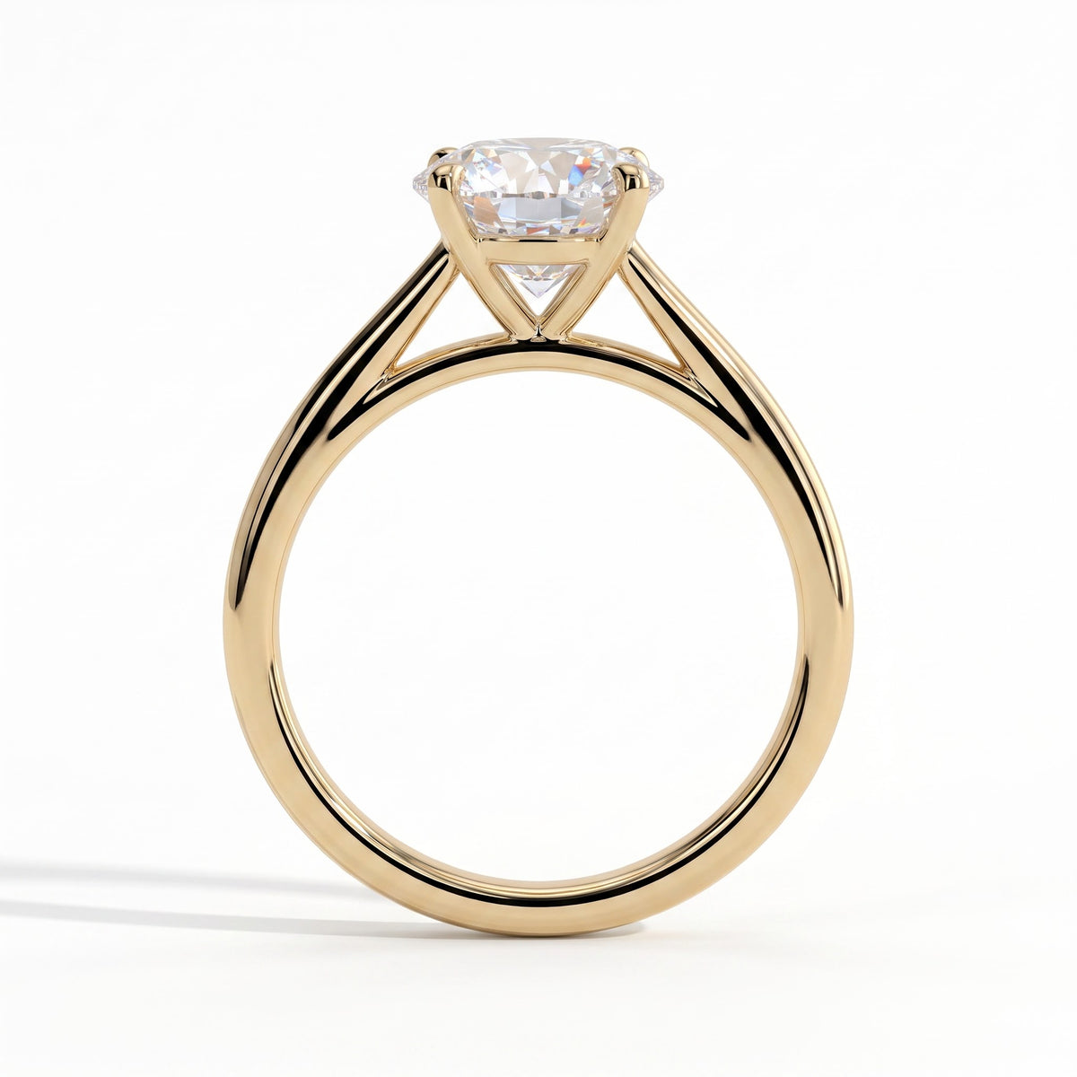 Round lab-grown diamond halo engagement ring in 18K (750) yellow gold, side profile