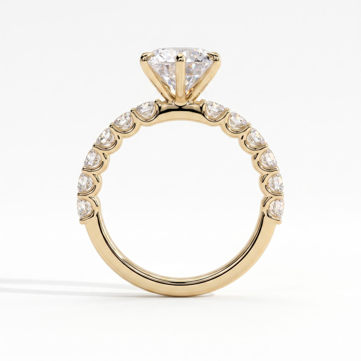 Round lab-grown diamond halo engagement ring in 18K (750) yellow gold, side profile