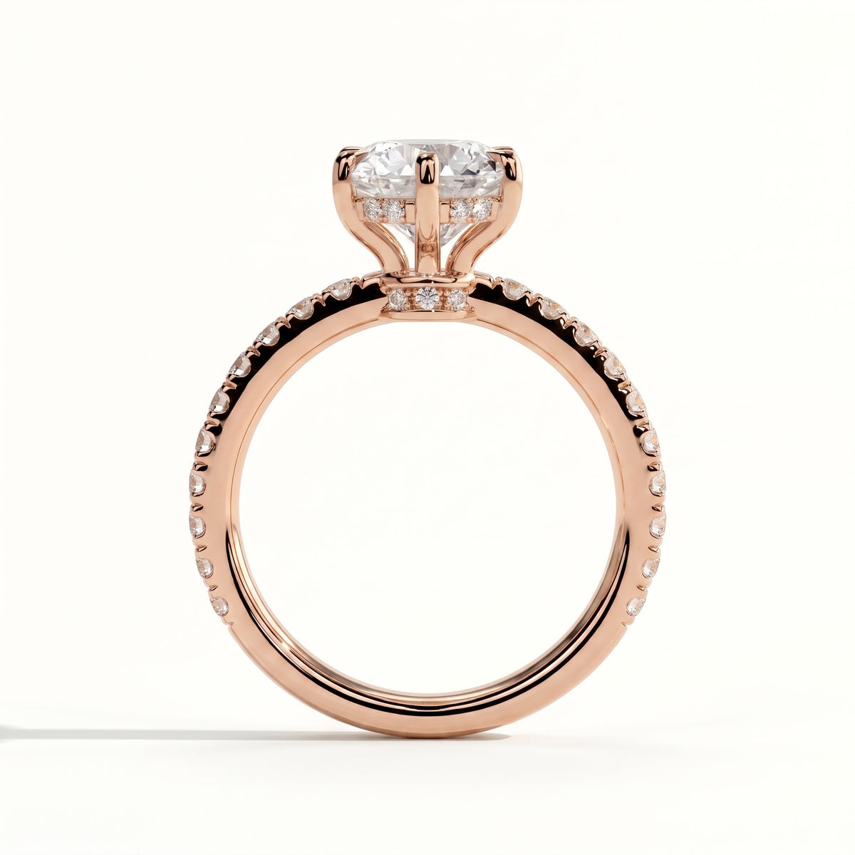 Round lab-grown diamond halo engagement ring in 14K (585) rose gold, side profile