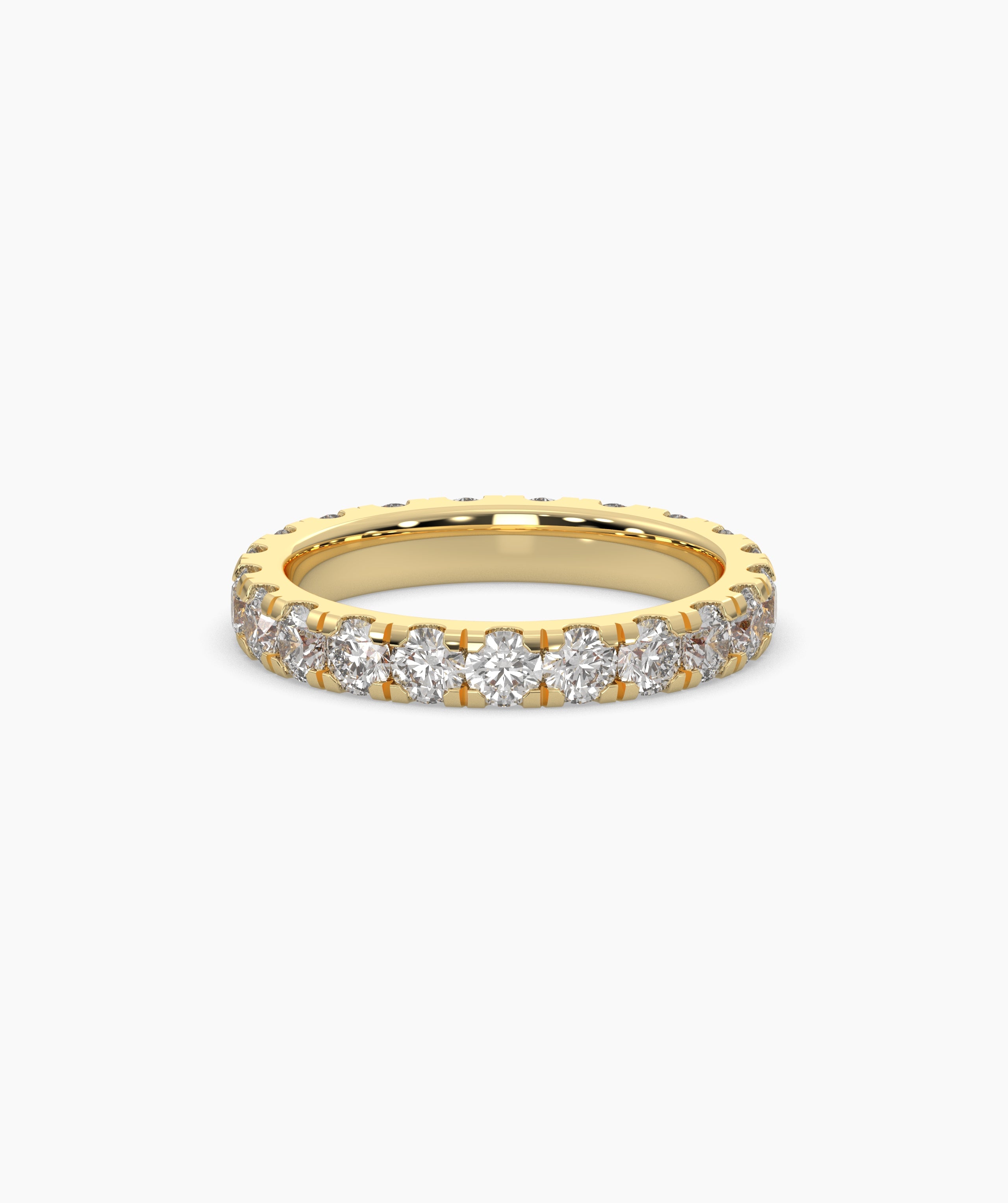 Gold ring with embedded diamonds on a white background.