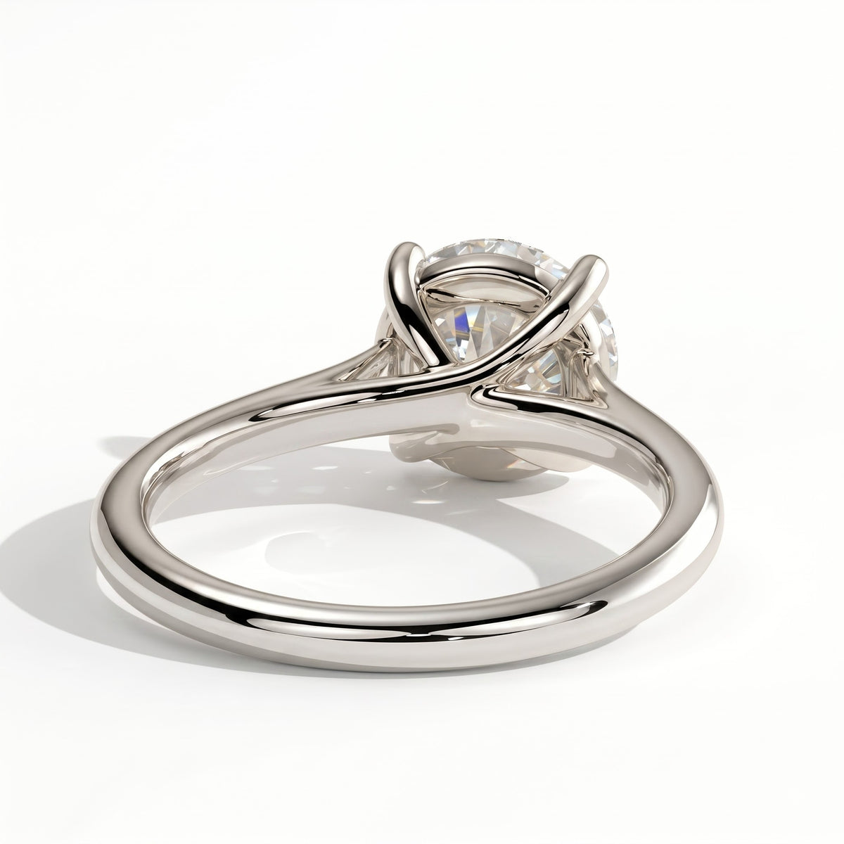 Round lab-grown diamond solitaire engagement ring in 14K (585) white gold, on white background
