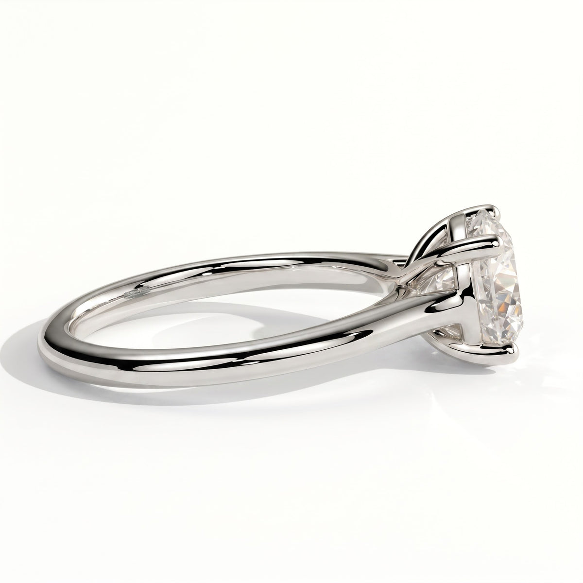 Round lab-grown diamond solitaire engagement ring in 950 platinum, detail view