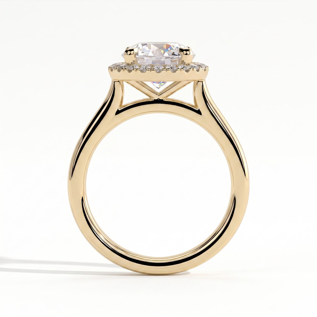 Round lab-grown diamond halo engagement ring in 18K (750) yellow gold, side profile