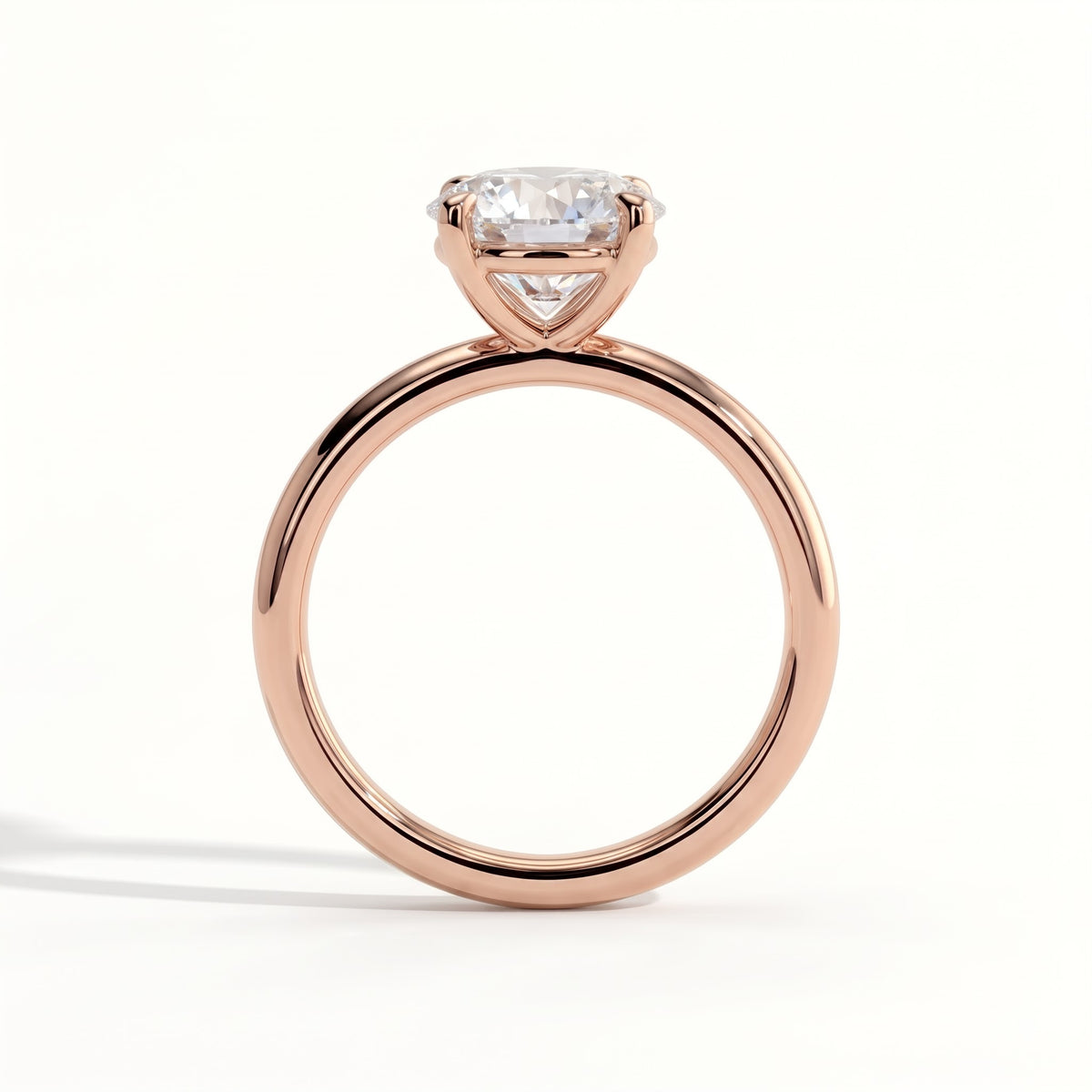 Round lab-grown diamond halo engagement ring in 18K (750) rose gold, side profile