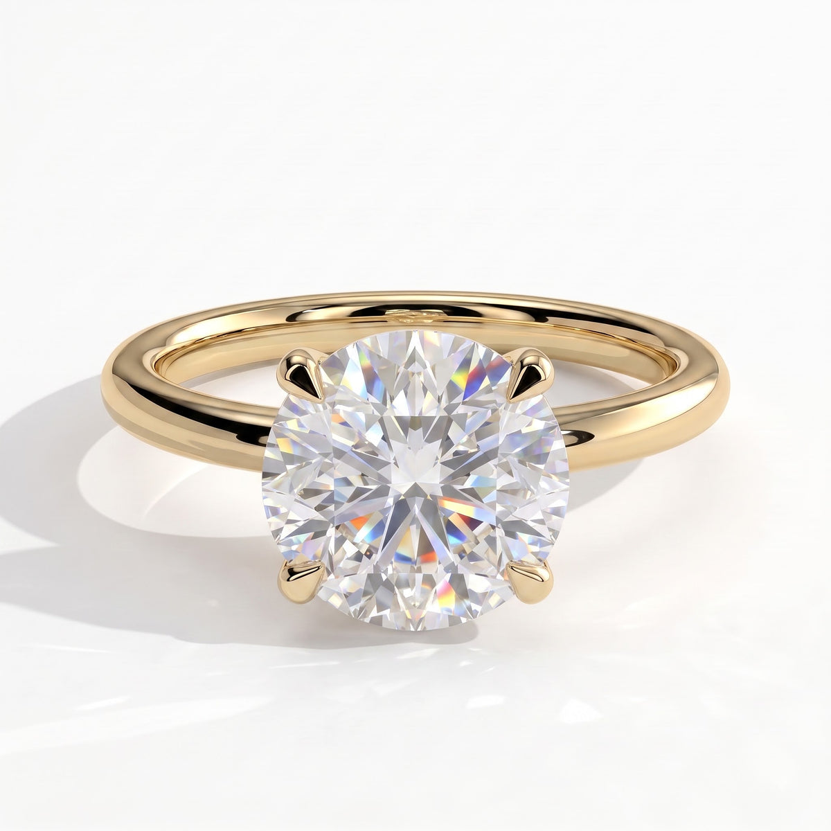 Round lab-grown diamond halo engagement ring in 18K (750) yellow gold, front view