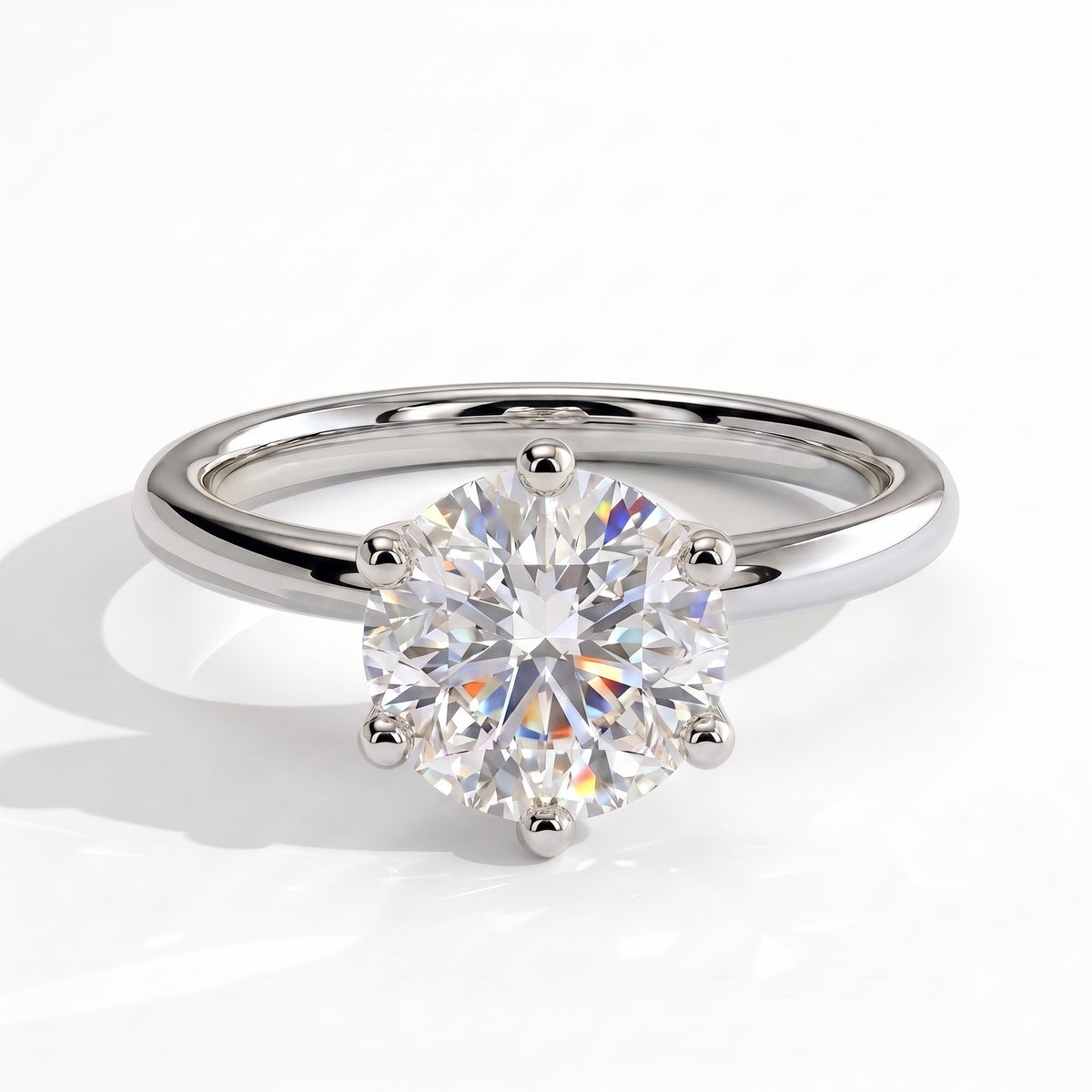 Round lab-grown diamond solitaire engagement ring in 950 platinum, front view