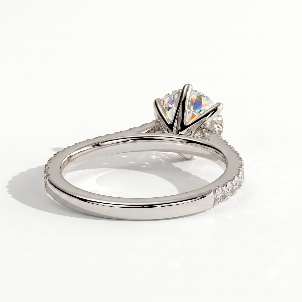 Round lab-grown diamond halo engagement ring in 14K (585) rose gold, on white background