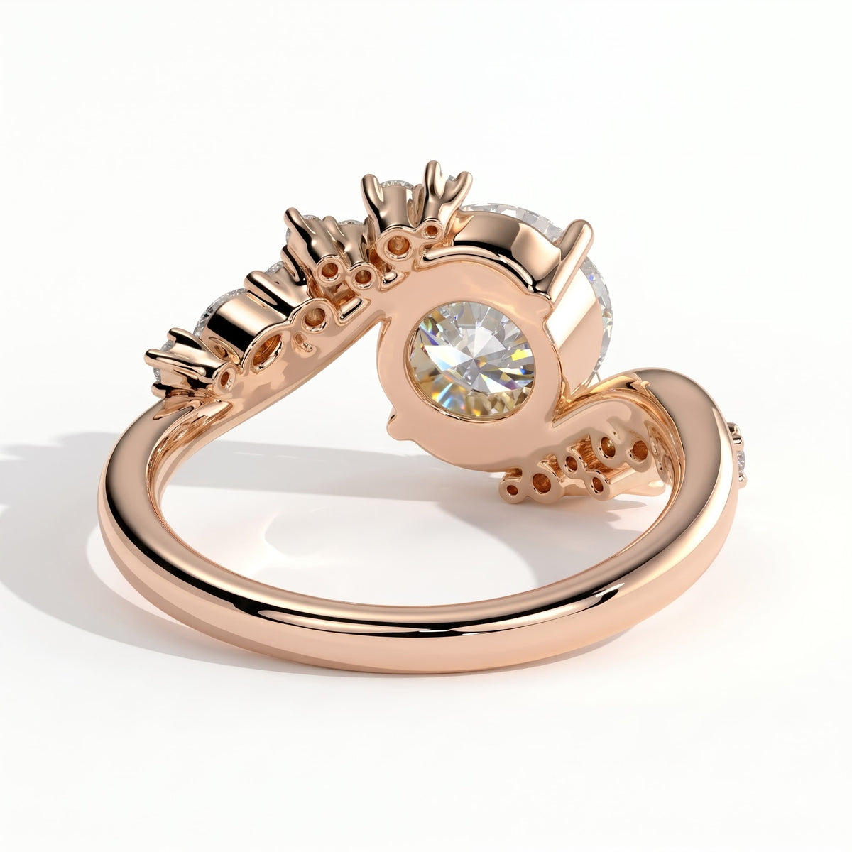 Round lab-grown diamond halo engagement ring in 18K (750) rose gold, on white background