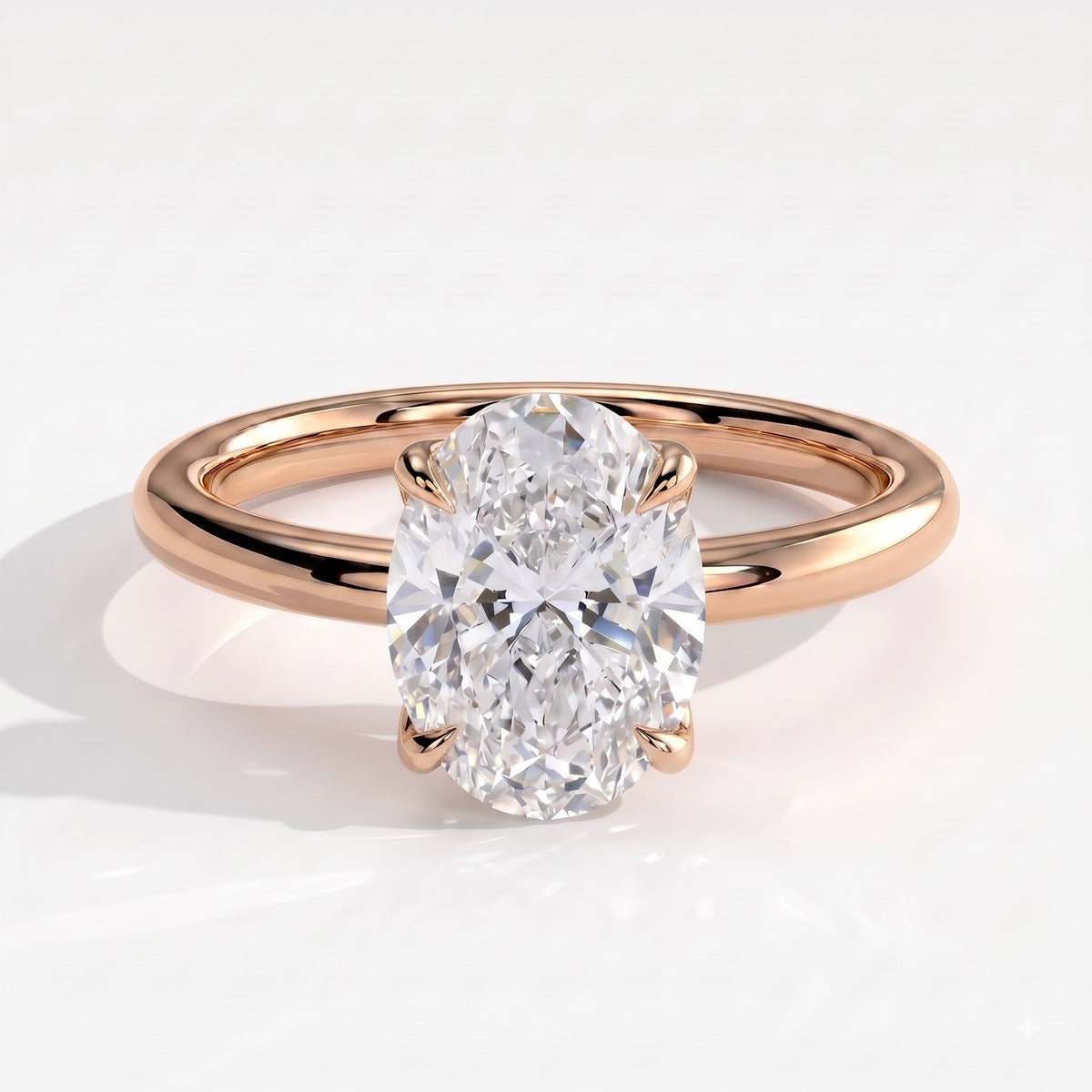 Oval lab-grown diamond solitaire engagement ring in 18K (750) rose gold, front view