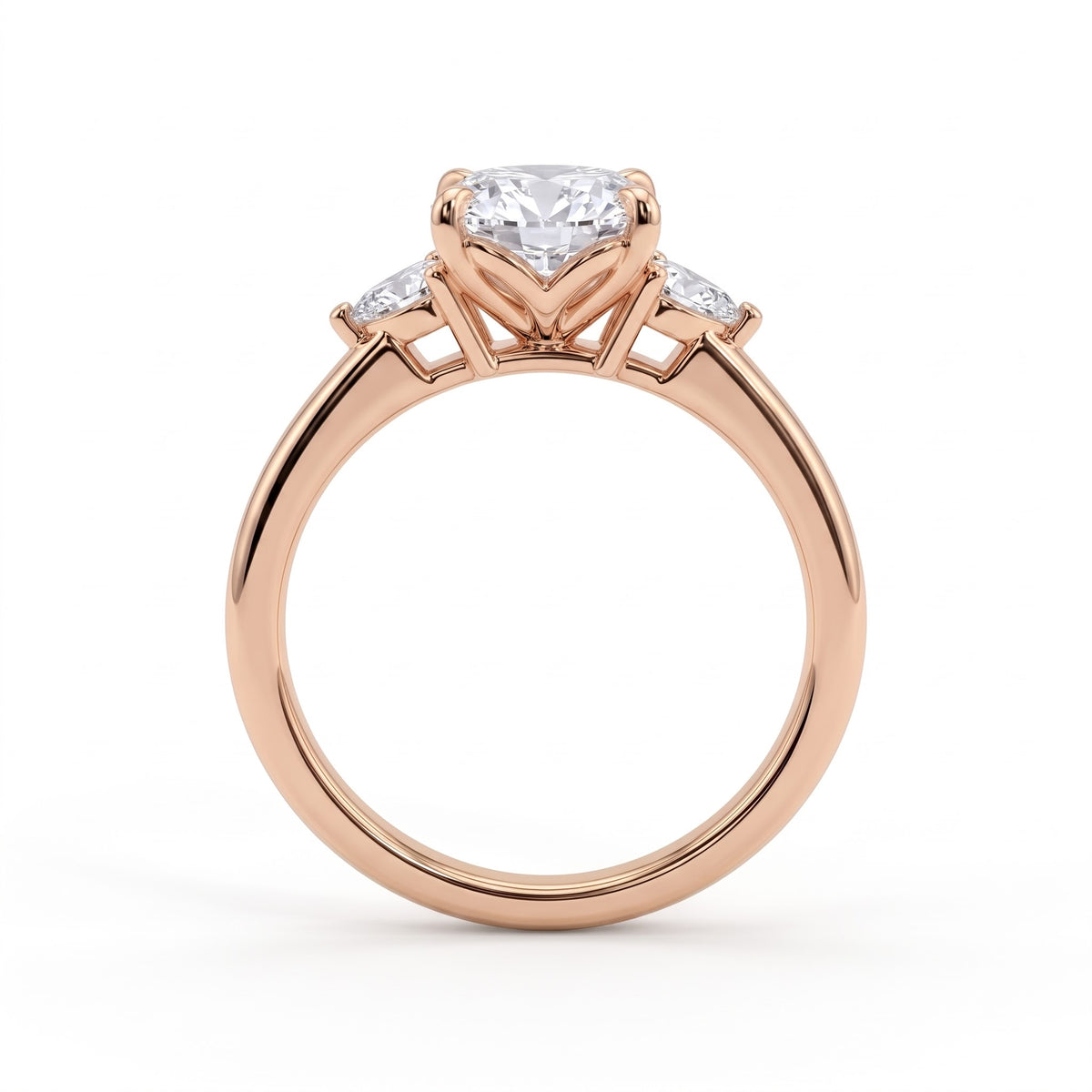 Oval lab-grown diamond three-stone engagement ring in 18K (750) rose gold, side profile