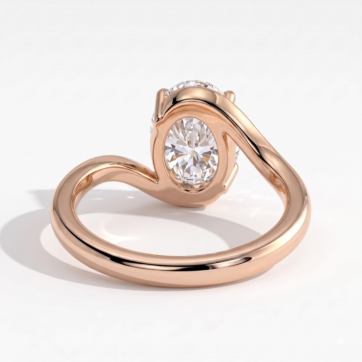 Oval lab-grown diamond solitaire engagement ring in 18K (750) rose gold, on white background