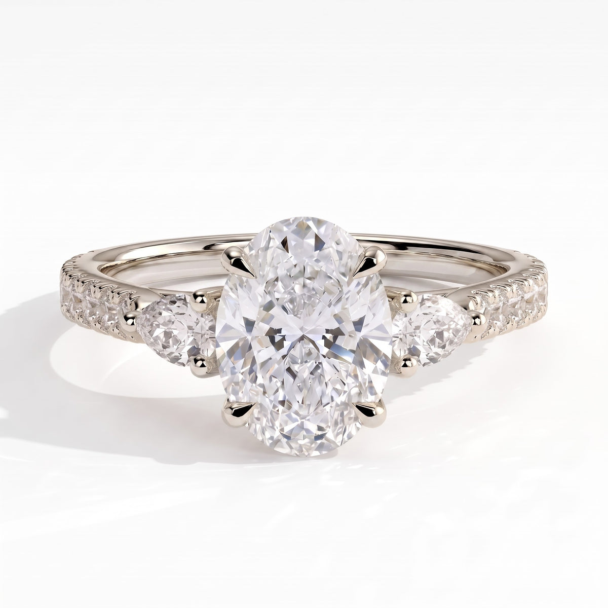 Oval lab-grown diamond three-stone engagement ring in 14K (585) white gold, front view