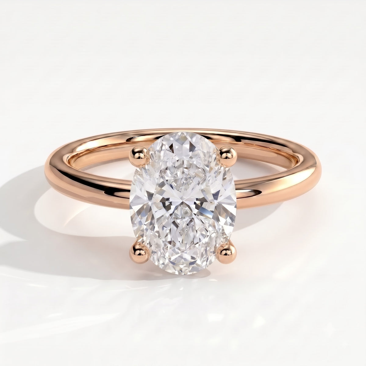 Oval lab-grown diamond solitaire engagement ring in 18K (750) rose gold, front view