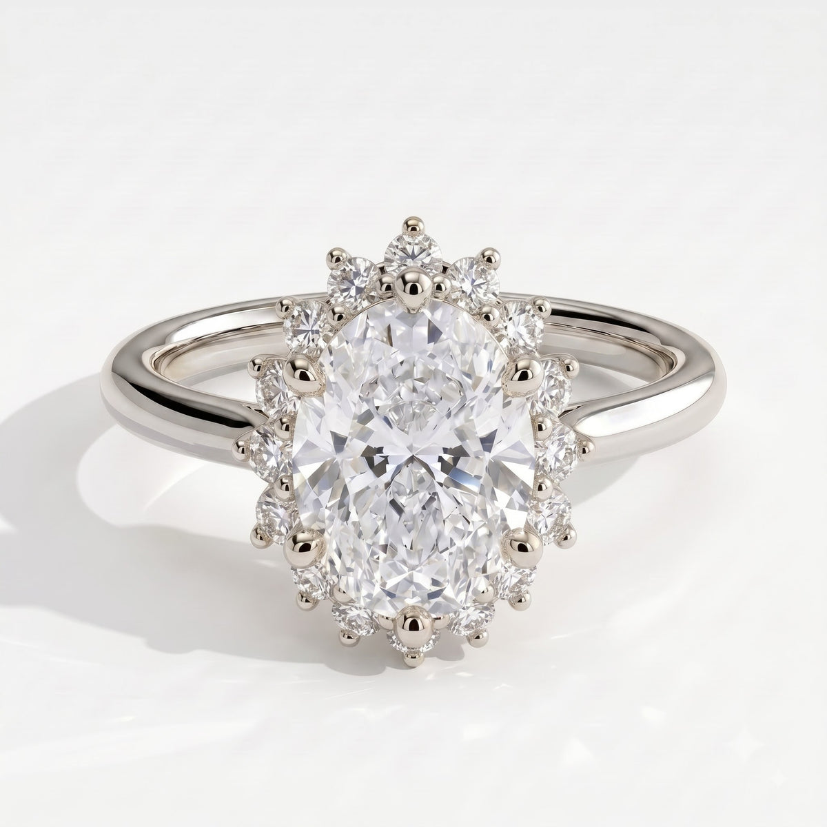Oval lab-grown diamond halo engagement ring in 18K (750) white gold, front view