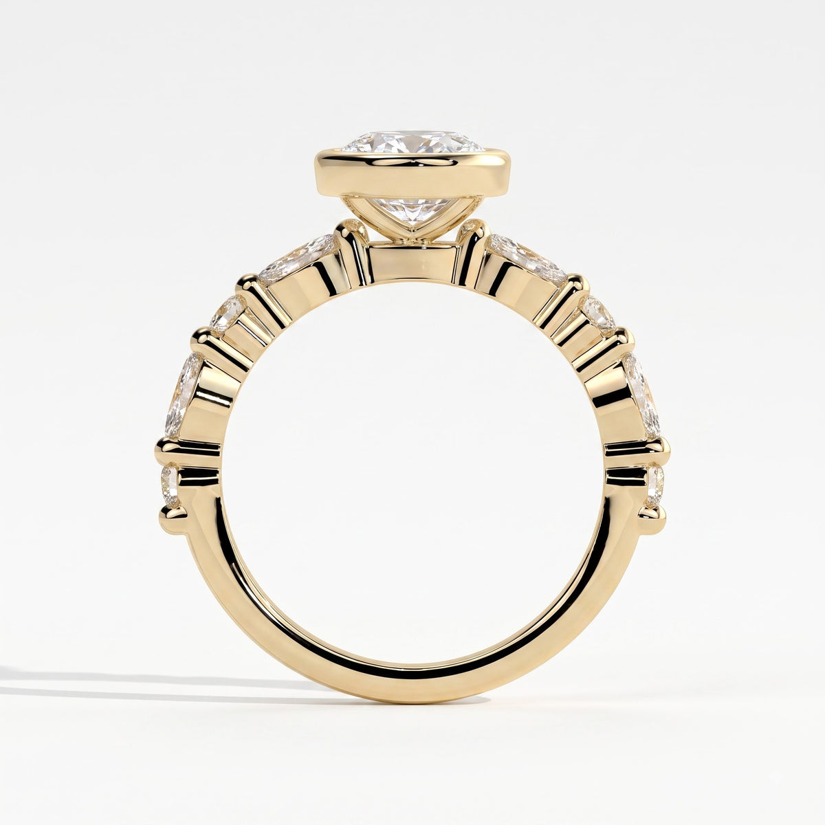 Oval lab-grown diamond bezel-set halo engagement ring in 14K (585) yellow gold, side profile