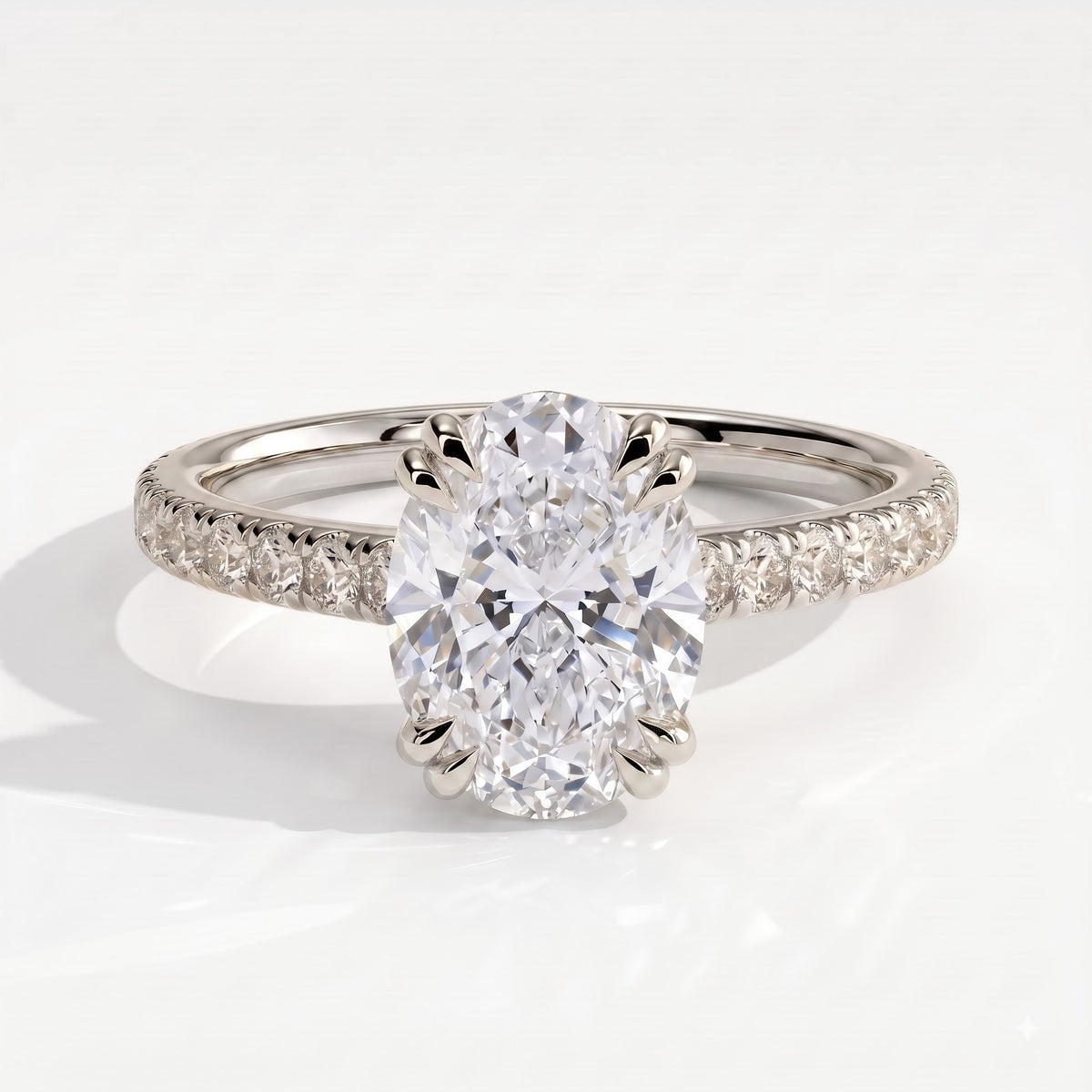 Oval lab-grown diamond halo engagement ring in 18K (750) white gold, front view