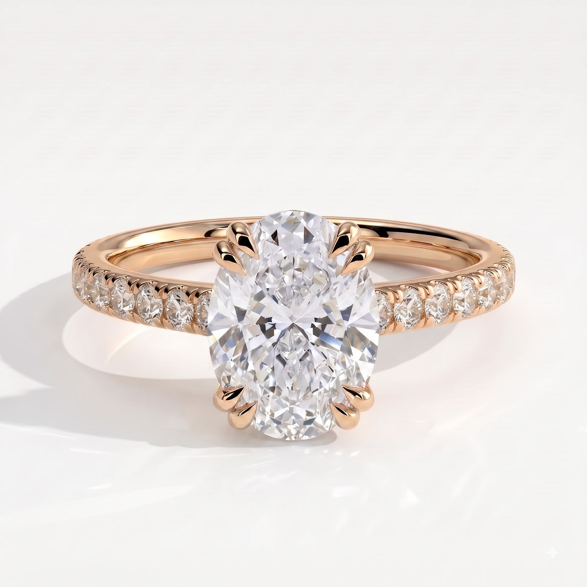 Oval lab-grown diamond halo engagement ring in 18K (750) rose gold, front view
