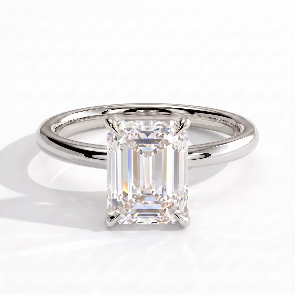 Emerald lab-grown diamond solitaire engagement ring in 18K (750) white gold, front view