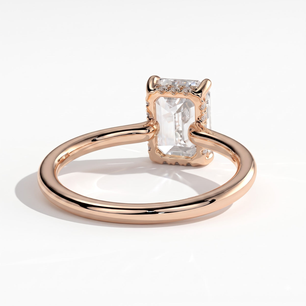 Emerald lab-grown diamond solitaire engagement ring in 18K (750) rose gold, on white background