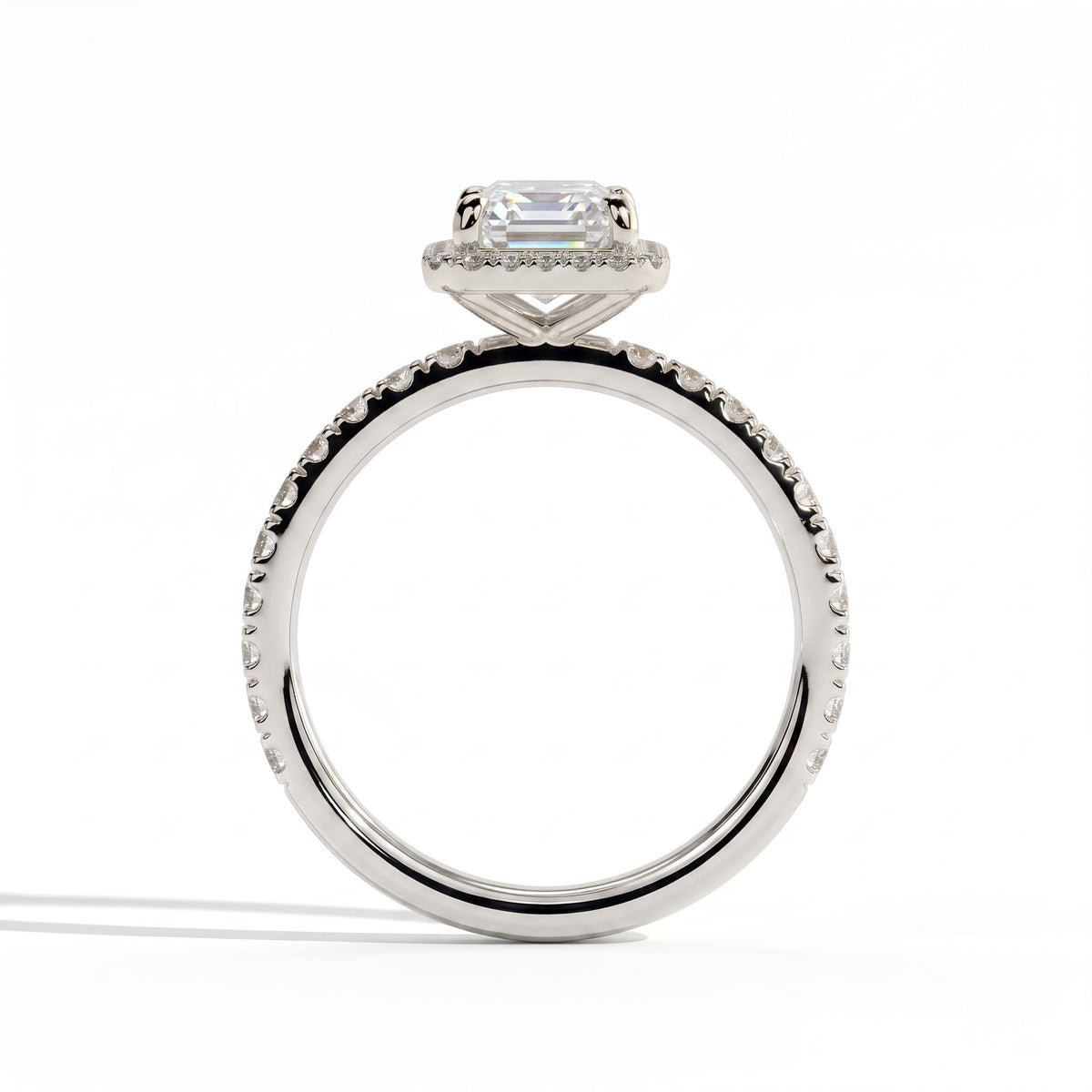Emerald lab-grown diamond halo engagement ring in 950 platinum, side profile