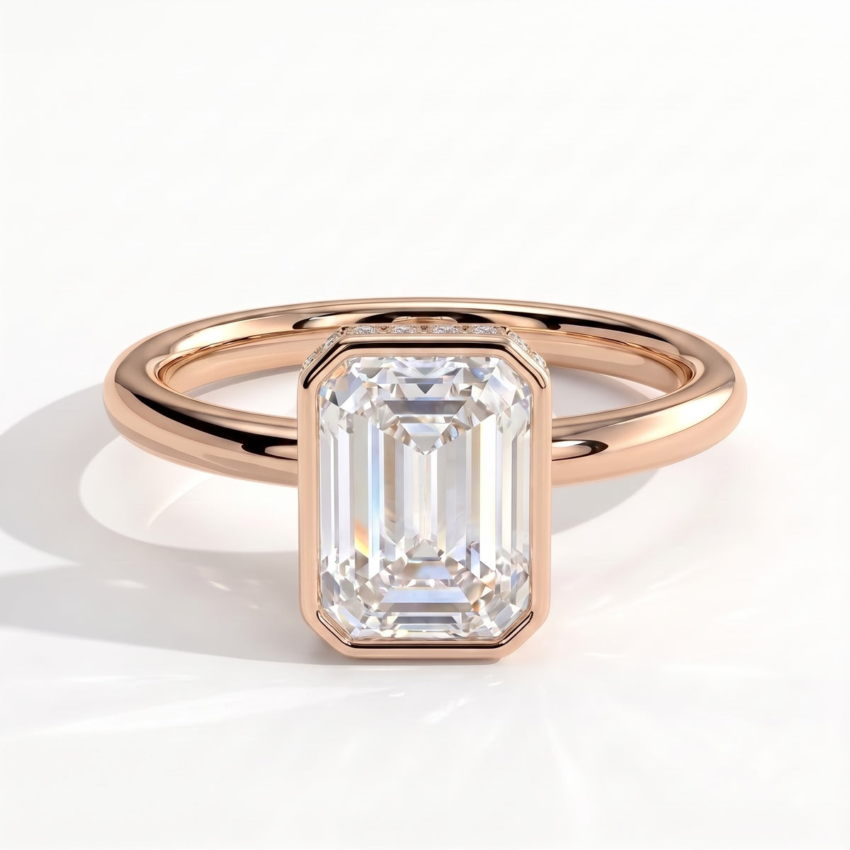 Emerald lab-grown diamond bezel-set halo engagement ring in 14K (585) rose gold, front view