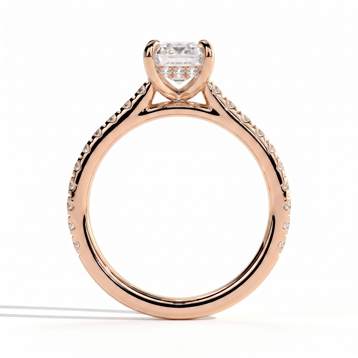 Emerald lab-grown diamond halo engagement ring in 18K (750) rose gold, side profile