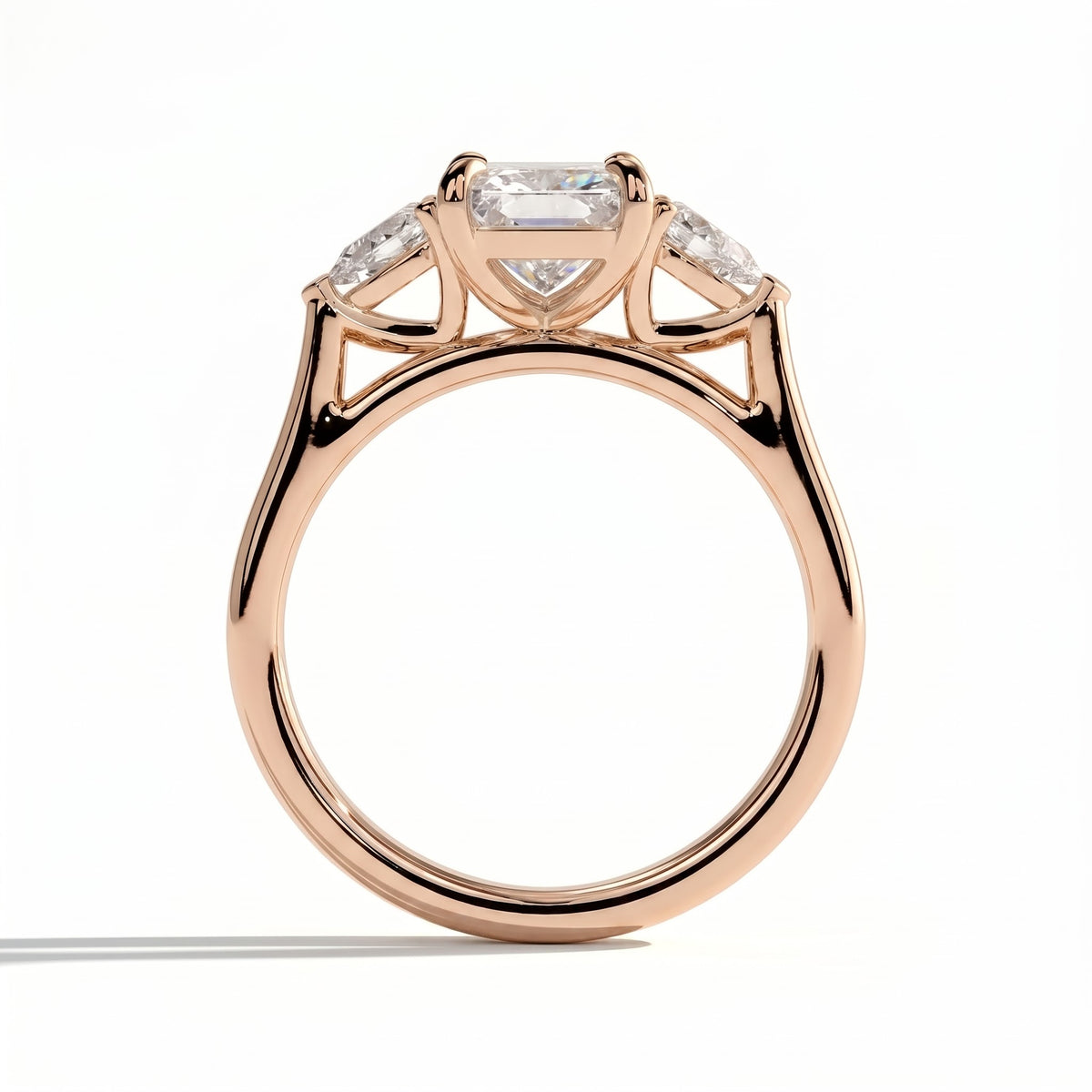 Radiant lab-grown diamond three-stone engagement ring in 14K (585) rose gold, side profile