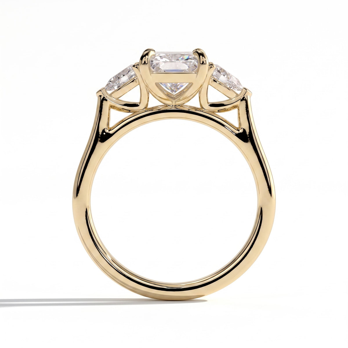 Radiant lab-grown diamond three-stone engagement ring in 14K (585) yellow gold, side profile