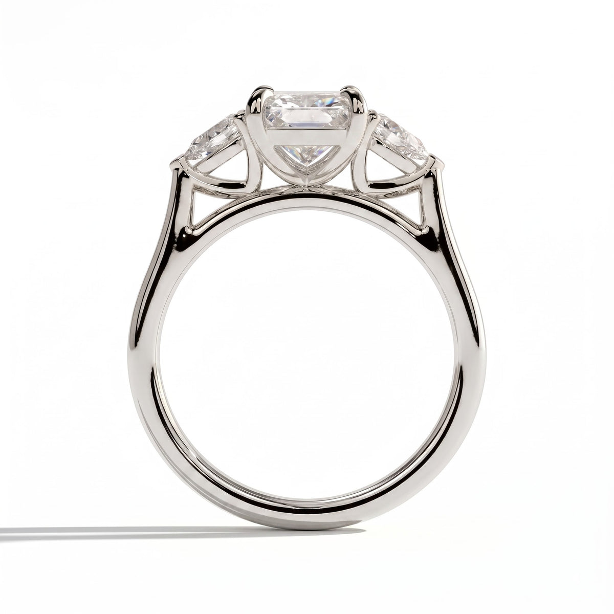Radiant lab-grown diamond three-stone engagement ring in 950 platinum, side profile