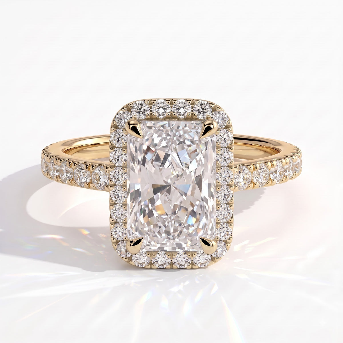 Radiant lab-grown diamond halo engagement ring in 18K (750) yellow gold, front view