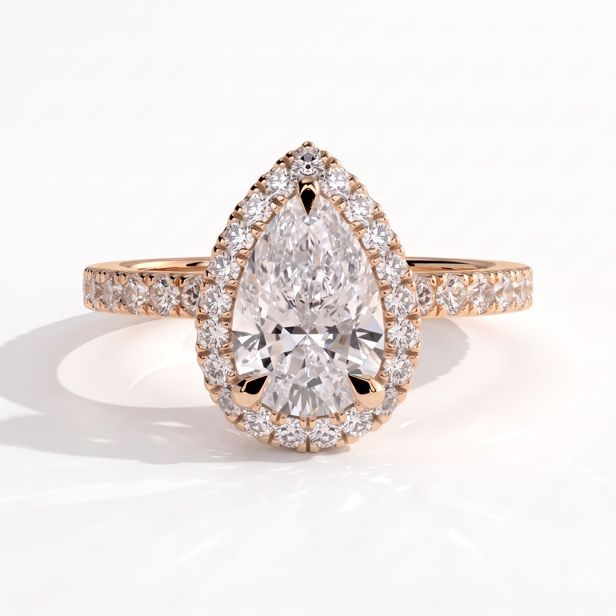 Pear lab-grown diamond halo engagement ring in 14K (585) rose gold, front view
