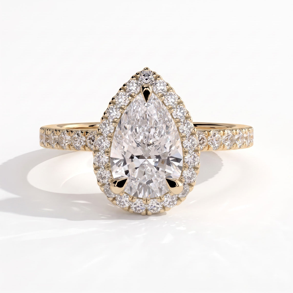 Pear lab-grown diamond halo engagement ring in 18K (750) yellow gold, front view