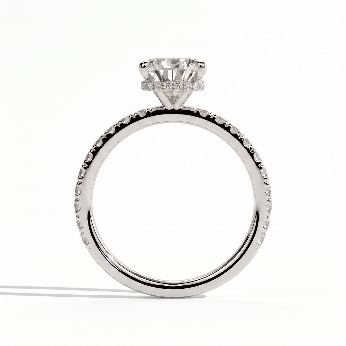 Pear lab-grown diamond halo engagement ring in 950 platinum, side profile