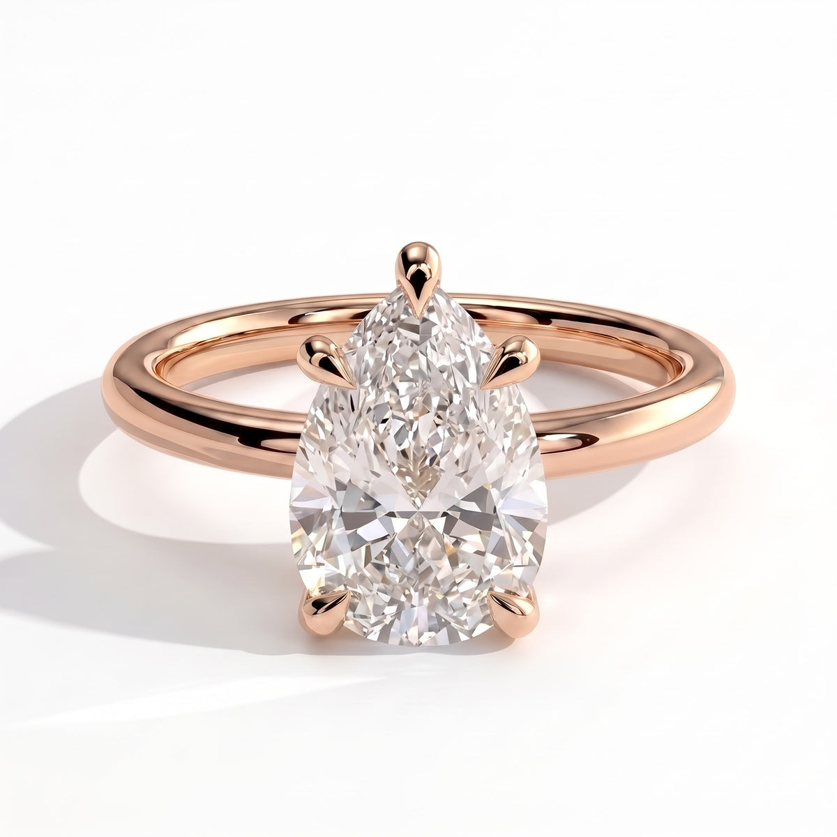 Pear lab-grown diamond solitaire engagement ring in 18K (750) rose gold, front view