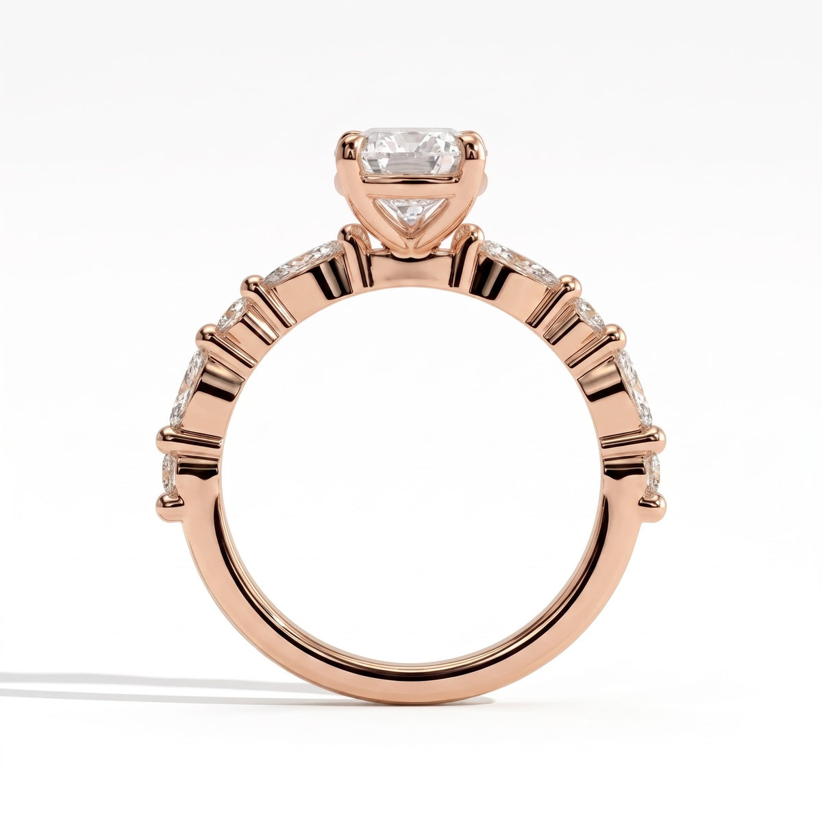 Pear lab-grown diamond halo engagement ring in 18K (750) rose gold, side profile