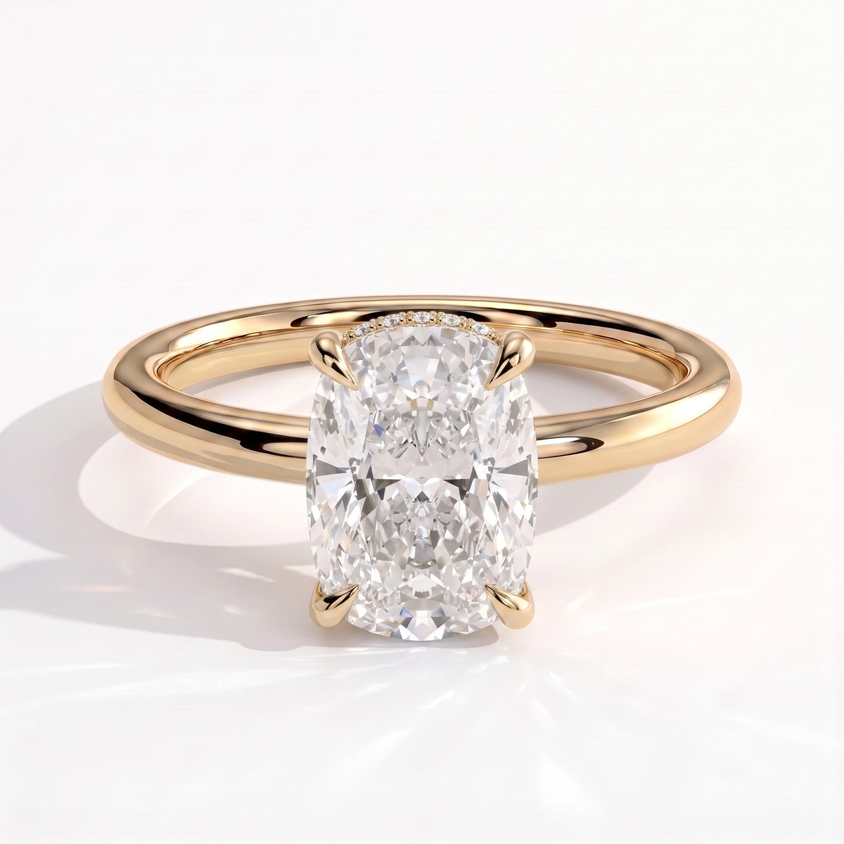 Elongated Cushion lab-grown diamond solitaire engagement ring in 18K (750) yellow gold, front view