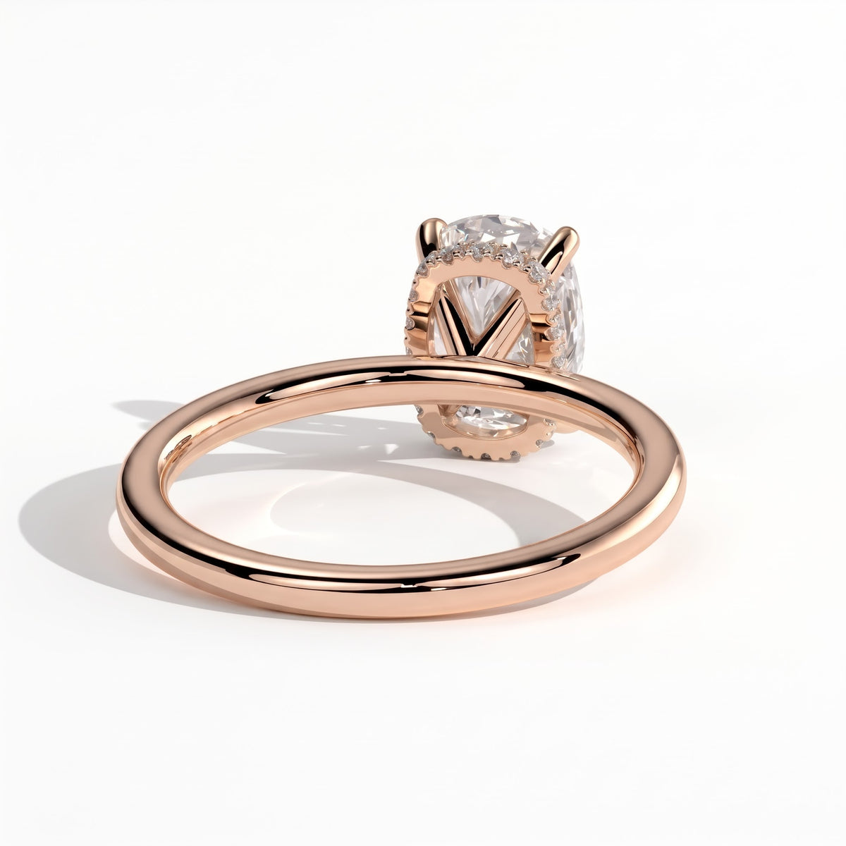 Elongated Cushion lab-grown diamond solitaire engagement ring in 14K (585) rose gold, on white background