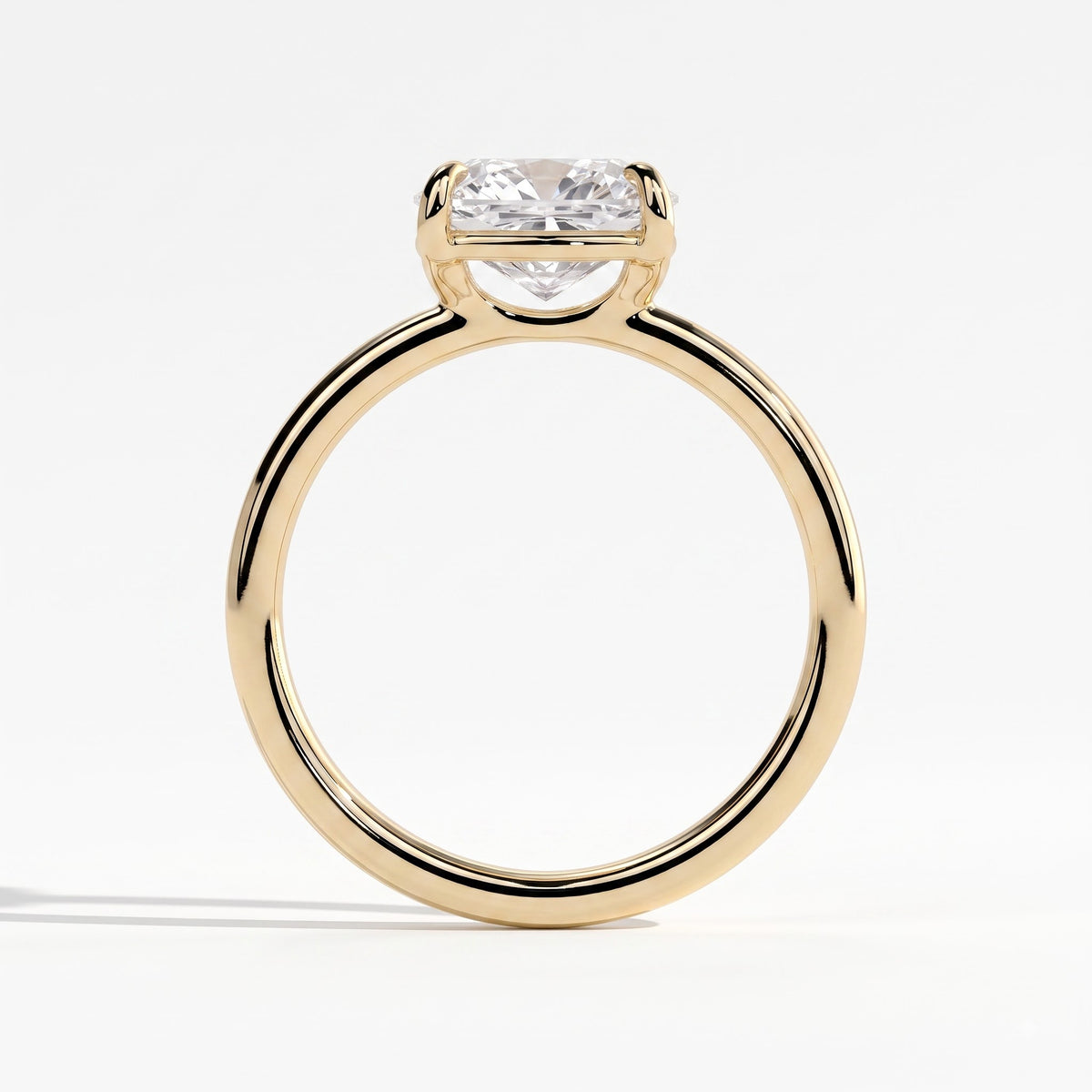 Elongated Cushion lab-grown diamond east-west solitaire engagement ring in 14K (585) yellow gold, side profile