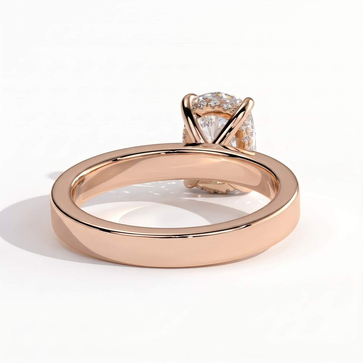 Elongated Cushion lab-grown diamond solitaire engagement ring in 18K (750) rose gold, on white background