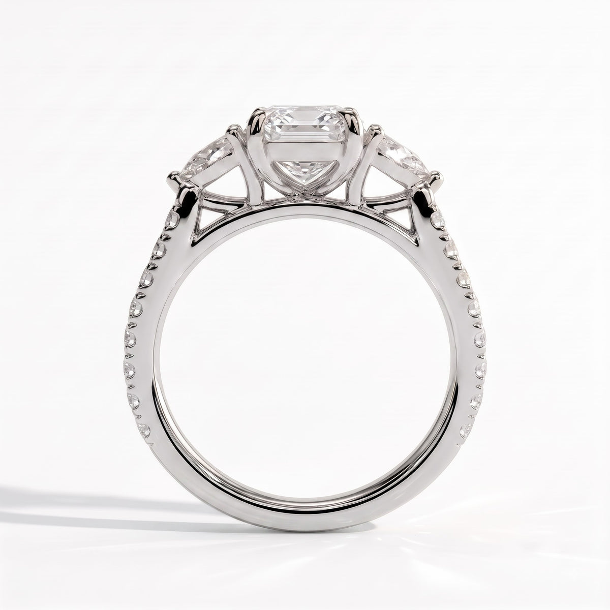 Elongated Cushion lab-grown diamond three-stone engagement ring in 14K (585) white gold, side profile